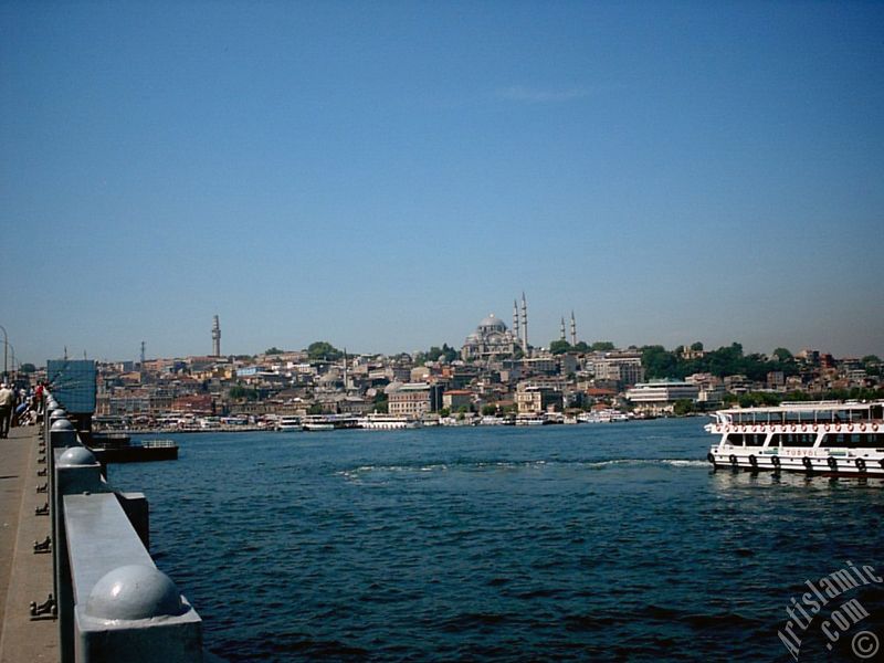 View of coast, (from left) Beyazit Tower, below Rustem Pasha Mosque and above it Suleymaniye Mosque from Galata Bridge located in Istanbul city of Turkey.
